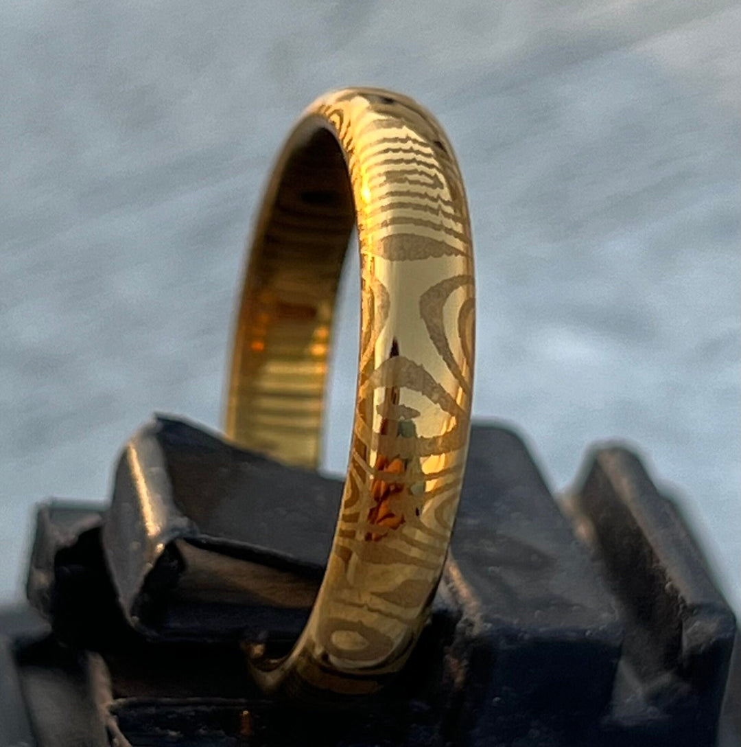 Finja Damascus Ring with Gold